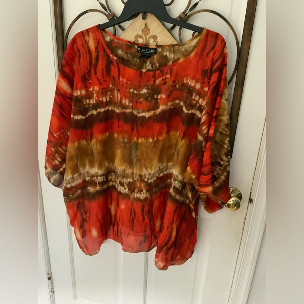 Beautiful sheer top by DIALOGUE-The New Language of Style. 3X